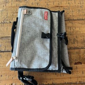 Skip Hop travel diaper changing pad and carrier